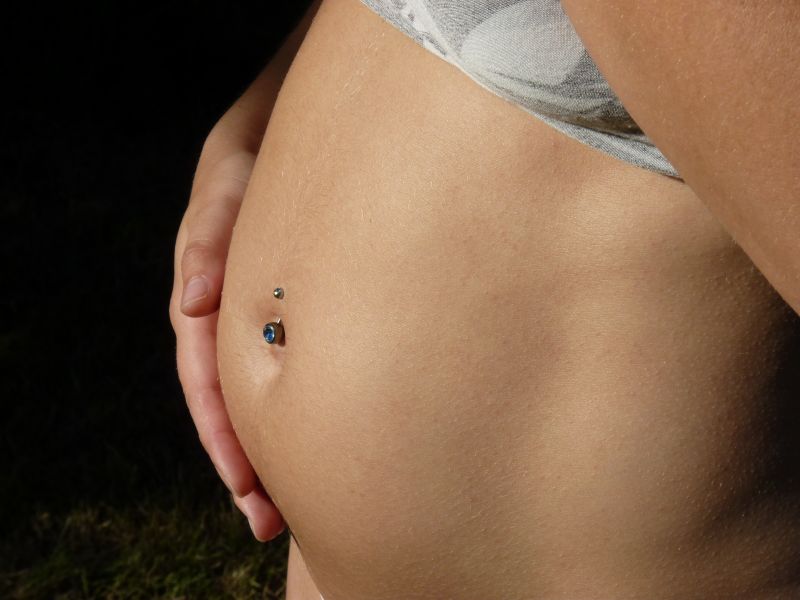 Pregnant Chick With A Pierced Belly Button
